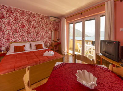 Red Studio Apartment– Overlooking the Sea